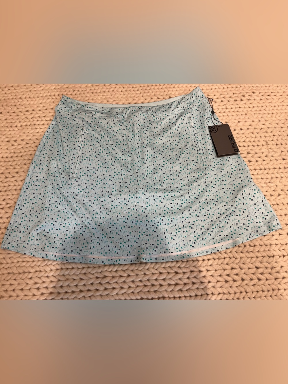 GFore Women’s Light Blue Floral Golf Skirt. Size Large. Brand new w/Tags